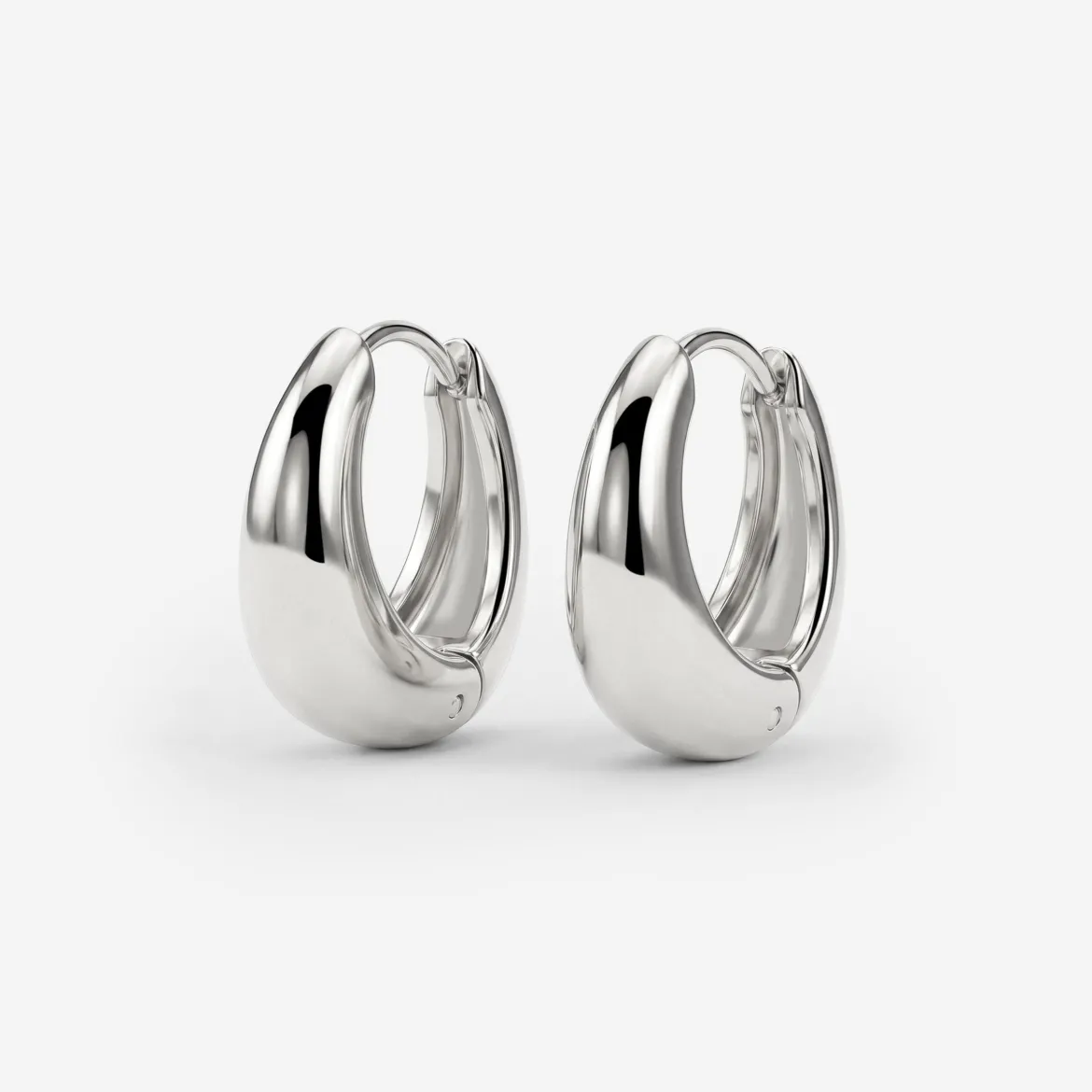 Gilded Curve Hoops Silber