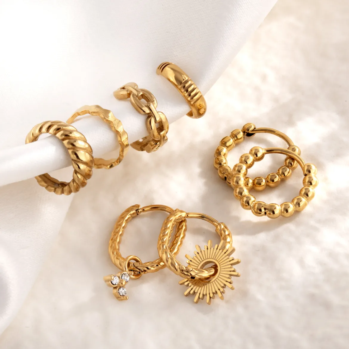 Sun Ray Oval Hoops Small Silber